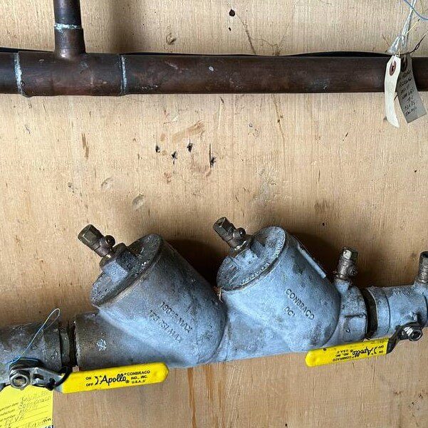 A tagged backflow preventer assembly flagged during testing